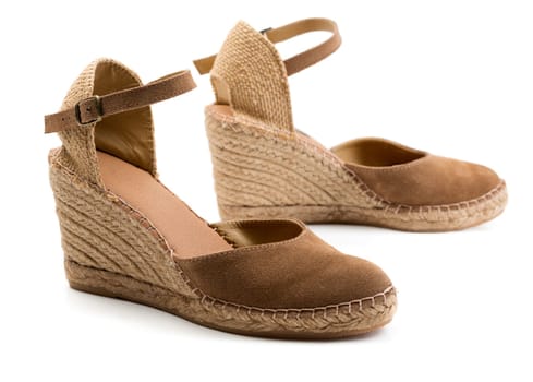 A pair of brown suede women's shoes. Isolate on white.