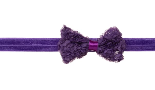 Dark-violet ribbon bow isolated on white background