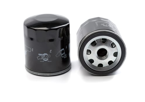 Two oil filter for a car. Isolate on white.