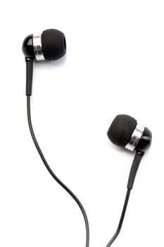 Small in-ear headphones isolated on white