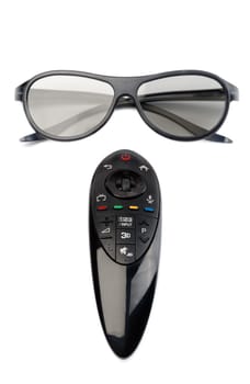3d glasses and remote control TV. Isolate on white.