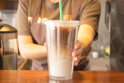 Double wall glass of iced coffee latte, stock photo