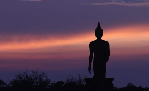 Silhouette of Buddha and the blue sky