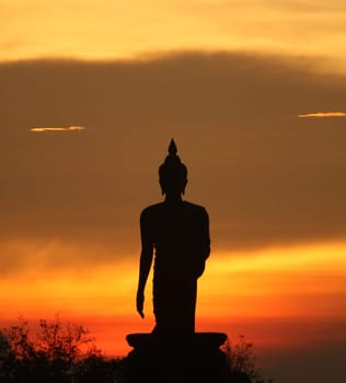 Silhouette of Buddha and the blue sky