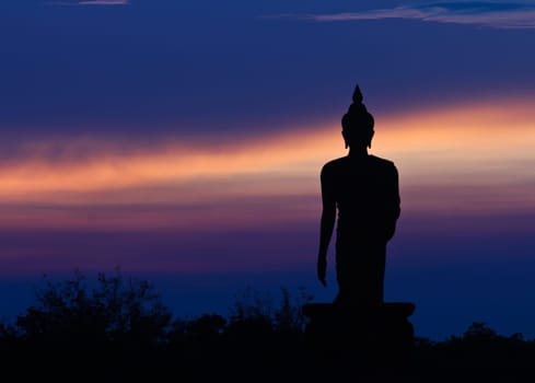 Silhouette of Buddha and the blue sky