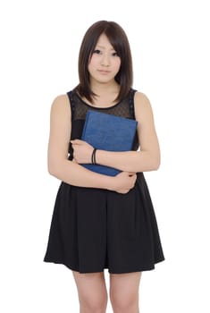 Young asian woman holding a book isolated on white background