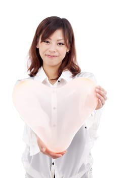 young asian girl holding a pink heart shaped balloon