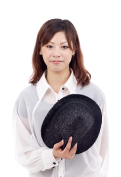 young asian girl holding hat, smiling, looking at camera