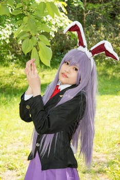 Young asian girl dressed in cosplay costume