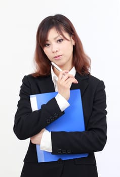 Portrait of young asian businesswoman thinking