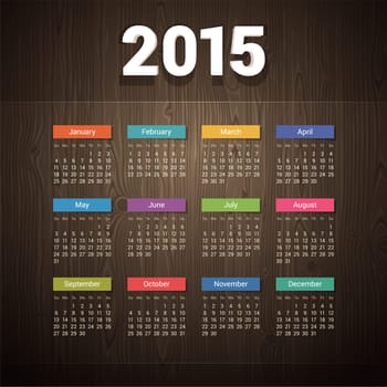 Simple 2015 calendar on Dark Wooden Background. Clipping paths included in additional jpg format.