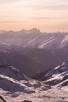 beautiful sunset on mountain at winter seasson and fresh snow