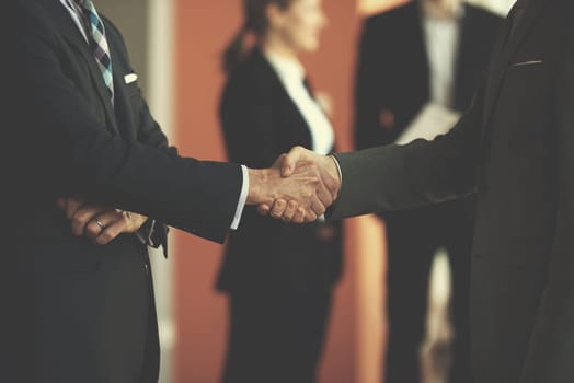 business partners, partnership concept with two businessman handshake