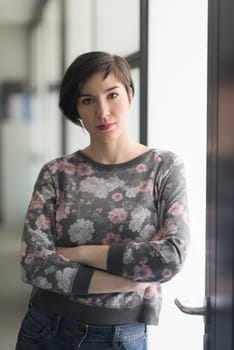 portrait of  young businesswoman in casual hipster clothes at modern startup business office interior