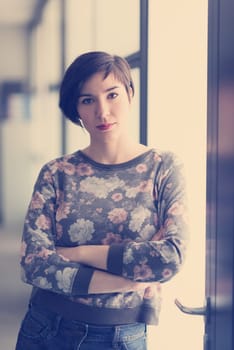 portrait of  young businesswoman in casual hipster clothes at modern startup business office interior