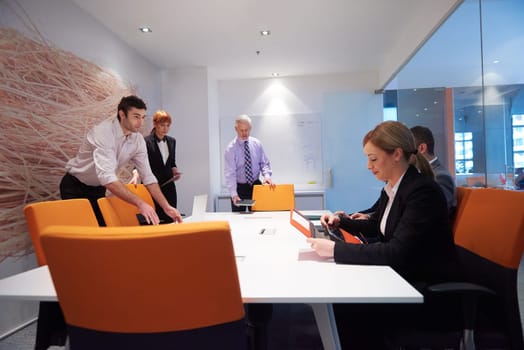 business people group with young adults and senior on meeting at modern bright office interior.