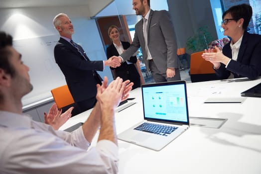 business people group with young adults and senior on meeting at modern bright office interior.