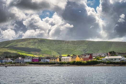 Colourful houses in Portmagee village, view from the sea, located at the edge of Atlantic Ocean, Ring of Kerry, Wild Atlantic Way, Ireland