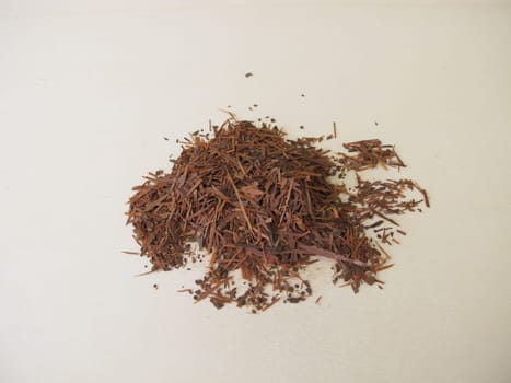 Loose Lapacho tea on a wooden board