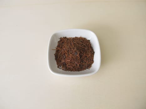 Loose Lapacho tea on a wooden board