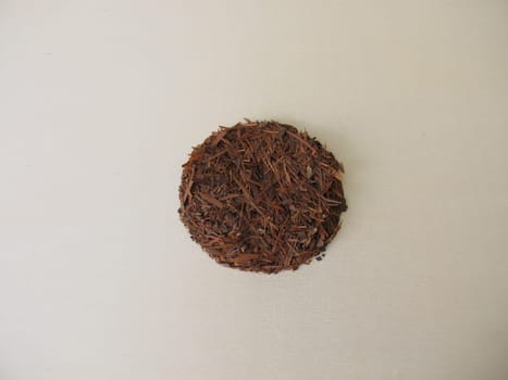 Loose Lapacho tea on a wooden board