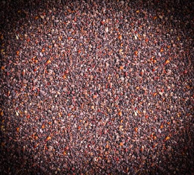 The colored sand. Texture and background. Selective focus