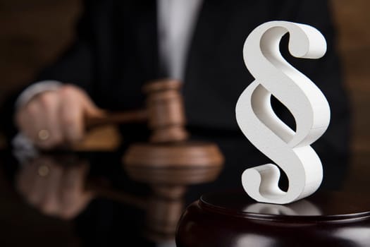 People, Court gavel,Law theme, mallet of judge and paragraph sign