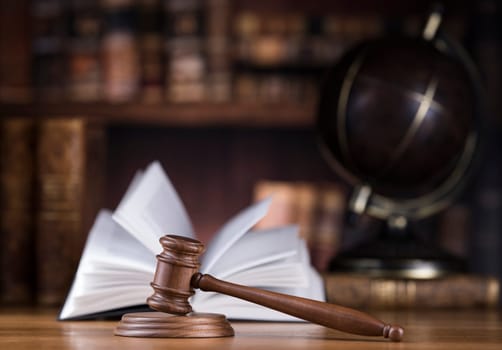 Globe background, Law theme, mallet of judge, wooden gavel