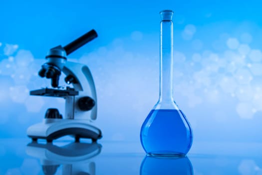 Microscope, Glassware, Laboratory beakers,Science experiment