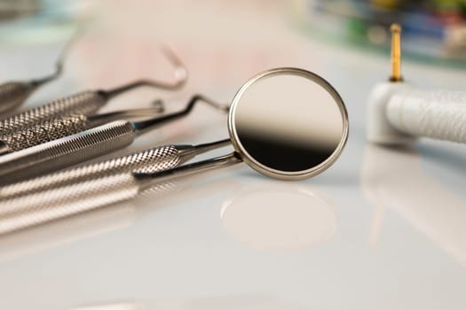 Dentist equipment on blue background
