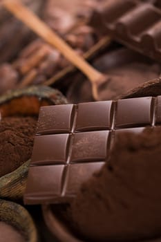 Cocoa pod and chocolate bar and food dessert background