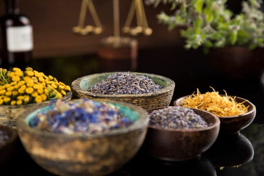 Black mirror background, Natural remedy, healing herbs