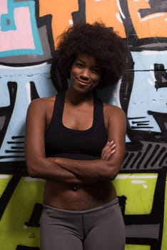 portrait of a young beautiful African American women in sports clothes after a workout at the gym