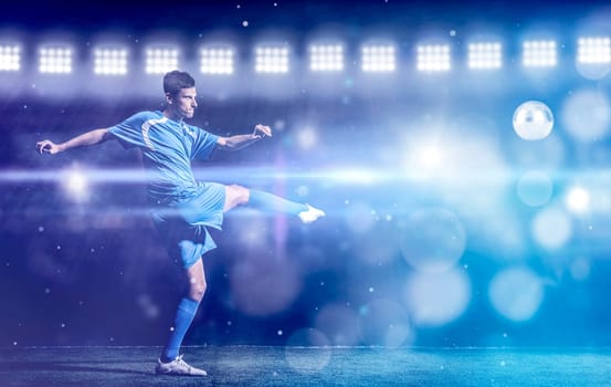 soccer player doing kick with ball on football stadium  field  isolated on black background