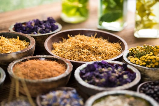 Herbs medicine and vintage wooden background