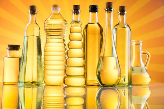 Olive oil bottles, olive branch and Cooking oils