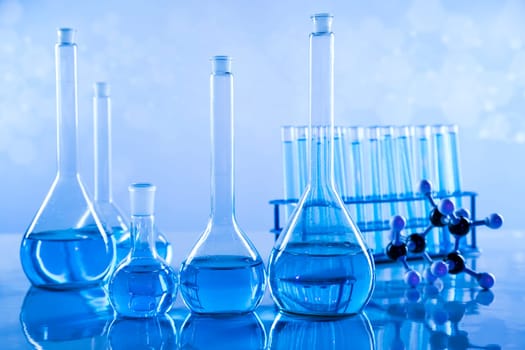 Laboratory beakers,Science experiment, blue background