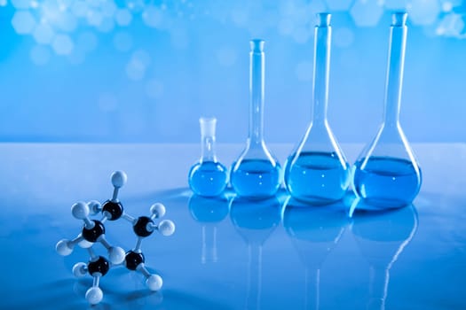 Laboratory beakers,Science experiment, blue background