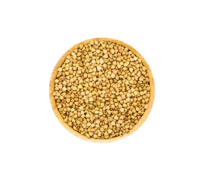 Buckwheat grainns in brown wooden bowl isolated on white background, top view. Healthy organic super food concept