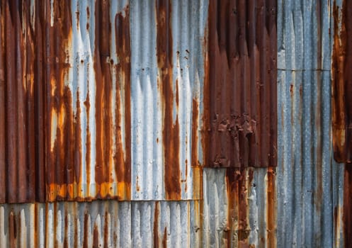 Rusted corrugated galvanised steel wall texture background