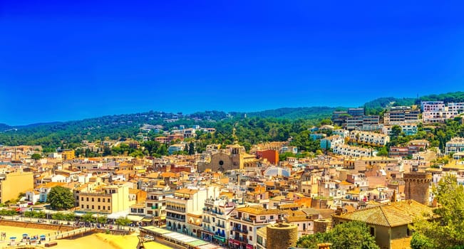 The Tossa de mar, Costa Brava, Spain: Old Town with blue sky.