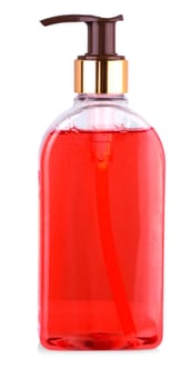 The close up of transparent bottle with liquid soap on white background