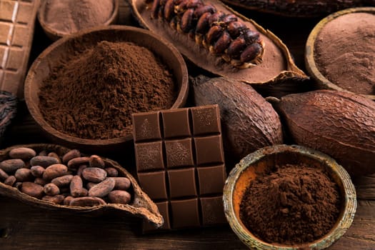 Chocolate bar, candy sweet, cacao beans and powder