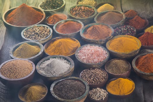 Smoke, Aromatic spices on wooden background