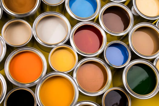 Open buckets with a paint, colors background