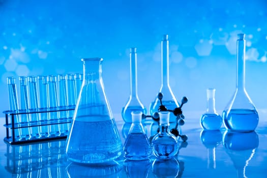 Laboratory beakers,Science experiment, blue background