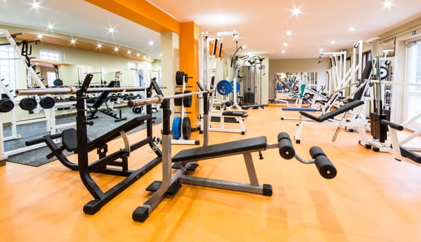 Interior view of a gym with equipment.