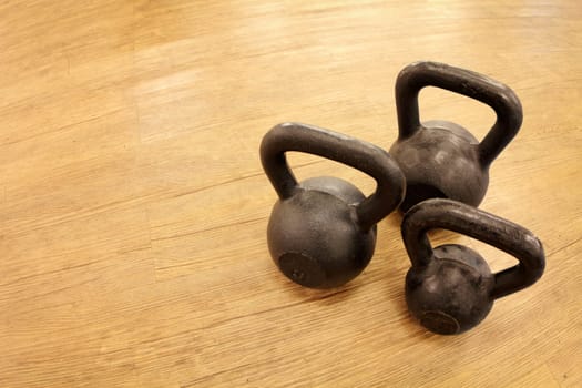 Kettlebell weights on the floor at the gym