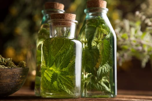 Oil and Natural medicine, wooden table background