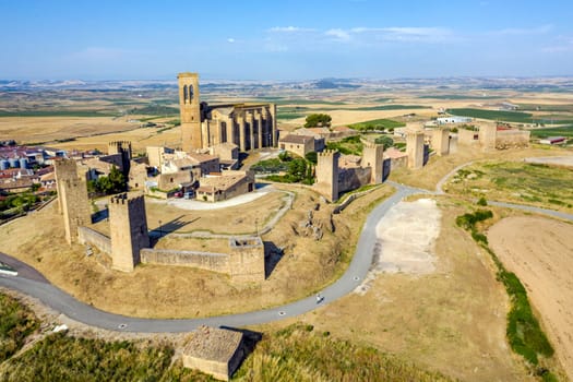 View of Artajona city with san Pedro church from fortress, Navarra Spain
